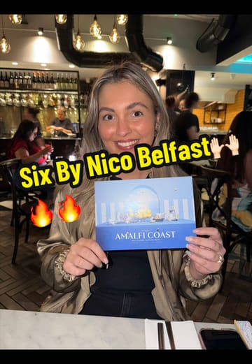 A couple visits Six by Nico to review their Amalfi Coast-themed tasting menu. The video features shots of the menu, the various courses served, and the creators' reactions to the food and service.