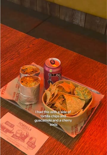 The video follows a creator visiting a Tortilla restaurant to redeem a free burrito offer for National Burrito Day. It captures the ordering process on a digital kiosk, the assembly of the burrito, and the final meal, providing a clear overview of the experience.