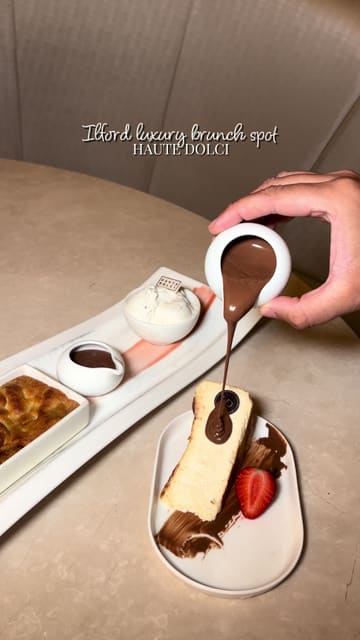 A promotional video for Haute Dolci in Ilford, highlighting their brunch and dessert menu, including pasta, cheesecake, and cookie dough, within a luxurious setting.