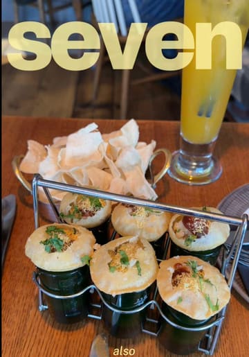 A vlog-style review of an Indian pub in Northwest London, featuring a variety of vegetarian small plates, snacks, and drinks. The creator provides personal recommendations and highlights the casual, social atmosphere of the venue.
