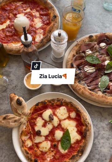 A promotional video for Zia Lucia pizza restaurant, highlighting their summer stamp card loyalty offer for families and showcasing their pizzas and desserts.