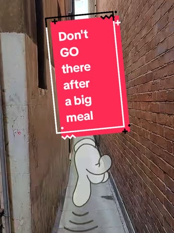 The video provides a first-person perspective walk through Brydges Place, identified as London's narrowest alley. It uses text overlays to explain the location and the 'big meal' hook, guiding the viewer through the narrow passage.