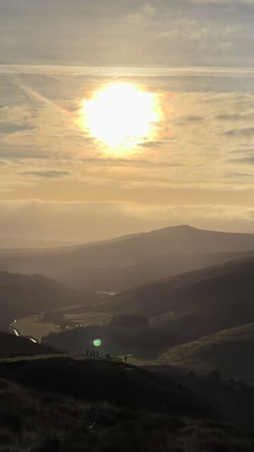 A short vlog-style video showcasing The Mount Kennedy Inn, located near the Wicklow Mountains. The video features a brief scenic opening, followed by shots of the pub's exterior and interior, and a selection of dishes including chicken wings, sesame chicken, lasagna, and chicken pesto tagliatelle.