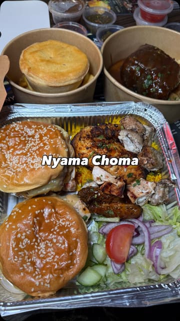A review of Nyama Choma in Bolton, an East African grill restaurant. The video features the creator showcasing various grilled meat dishes, including burgers, ribs, and chicken, as well as the restaurant's interior and cooking process.