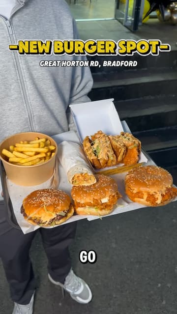 A creator visits a new burger spot in Bradford, showcasing the exterior, interior, and a variety of menu items including smash burgers, chicken toasties, and wraps.