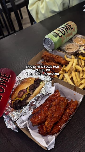 A creator visits the newly opened Hungr Hub in Sandyford, Dublin, providing a tour and taste test of three distinct vendors: Dos Burritos, TUCKK INN, and Lume.