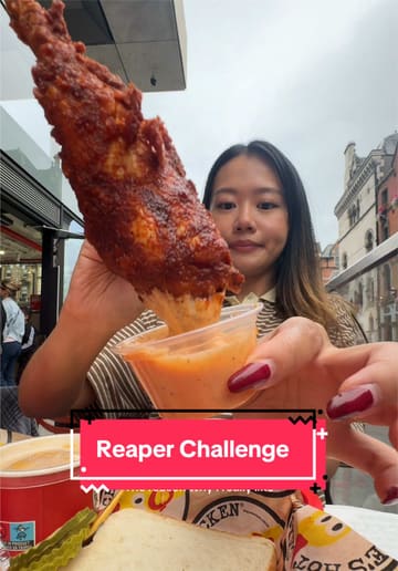 A creator visits Dave's Hot Chicken in Dublin to attempt the 'Reaper' spicy chicken tender challenge. The video documents the ordering process, the food items (sliders, tenders, mac and cheese, loaded fries, milkshake), and the reaction to the extreme spice level.