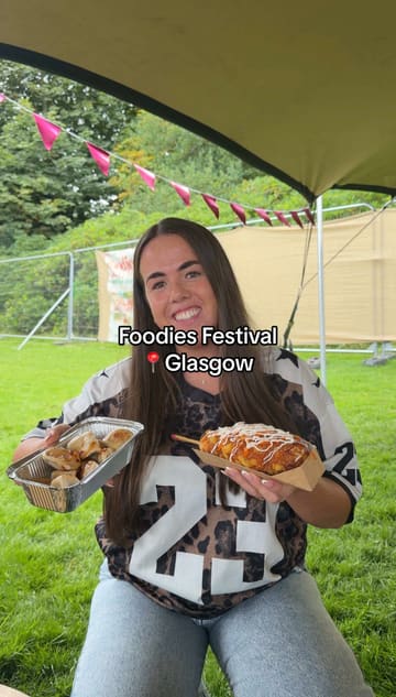 A vlog-style video showcasing a visit to the Foodies Festival in Glasgow, highlighting various food stalls, drinks, and activities like the Indomie noodle game.