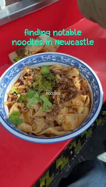 A short, engaging vlog-style review of a noodle stall located in Grainger Market, Newcastle. The video features the preparation of Xi'an-style noodles and dumplings, highlights the menu, and includes the creators' reactions to the food.