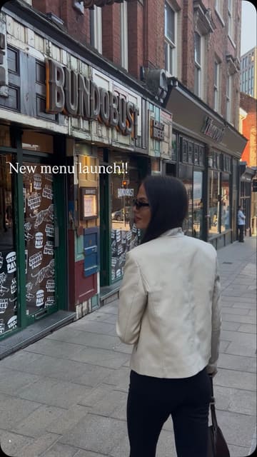 A short, energetic reel featuring a visit to Bundobust. The video captures the exterior, the menu, and a selection of Indian-inspired vegetarian small plates and drinks, highlighting the sharing-style dining experience.