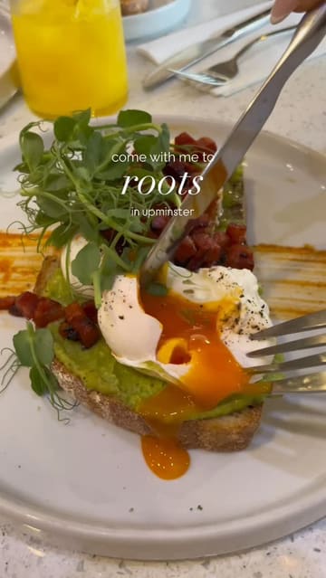 A short, energetic video showcasing a brunch visit to Roots in Upminster. The creators highlight the interior, the menu, and various dishes including avocado toast, pancakes, and a falafel bowl, while also mentioning the venue's evening events.