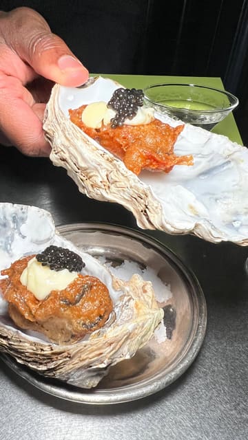 A couple visits Noisy Oyster in Shoreditch for a date night, showcasing a variety of dishes including oysters, crudo, octopus, pasta, and dessert, along with cocktails.