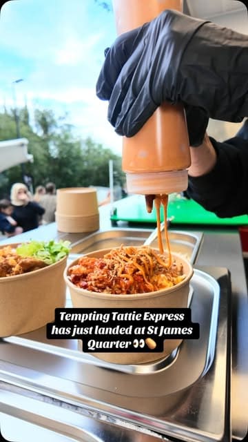 A review of the Tempting Tattie Express stall at St James Quarter in Edinburgh, highlighting the quick service, customisable baked potatoes, and the variety of toppings available.