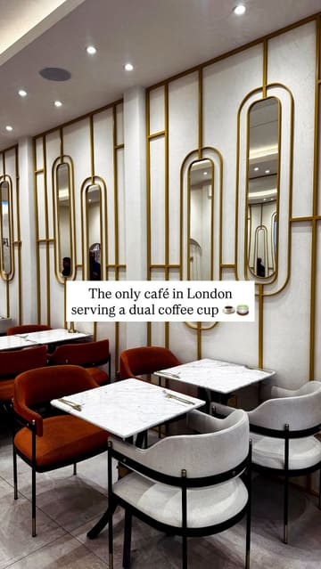 A promotional video for Nour Cafe in London, showcasing their unique dual coffee cups and a variety of brunch dishes including steak baguette, prawn brioche, full English breakfast, chicken schnitzel, pancakes, French toast, waffles, and cheesecake.