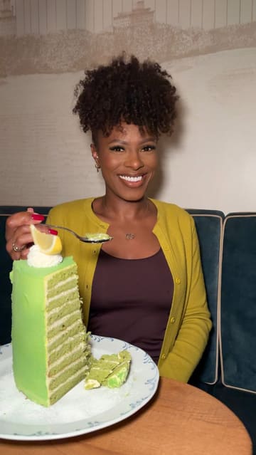 A short-form review of LAVO restaurant, featuring a variety of dishes including a 20-layer matcha cake, truffle pasta, and burrata. The video combines shots of the food, the venue interior, and the creator's reactions.