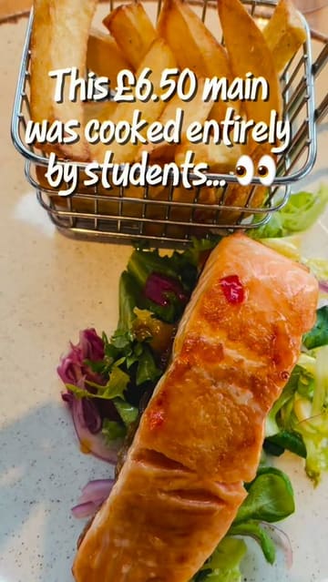 A short, informative reel showcasing the menu and interior of The Classroom in Cardiff, a student-run restaurant. The video uses a series of static shots of various dishes and the dining area, overlaid with text detailing the prices and the unique concept of the venue.