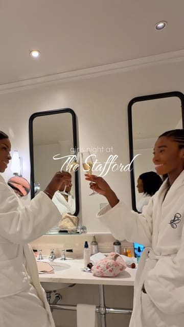 A montage video showcasing a luxury stay at The Stafford London, featuring a room tour of a junior suite, champagne service, and dinner at the hotel's American Bar.