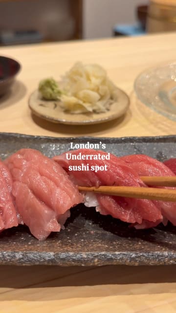 A couple visits Mikuniya, a Japanese restaurant in Swiss Cottage, London, reviewing a variety of dishes including sushi, sashimi, tempura, and izakaya-style small plates. The video highlights the authenticity of the food, the quality of the ingredients, and the welcoming atmosphere, while also noting the reasonable pricing.