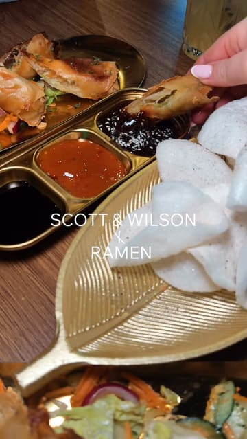 A promotional reel for Scott & Wilson featuring their new ramen dishes, stir-fry options, spring rolls, and cocktails. The video uses a montage format with music and text overlays to highlight the menu and the venue's interior.