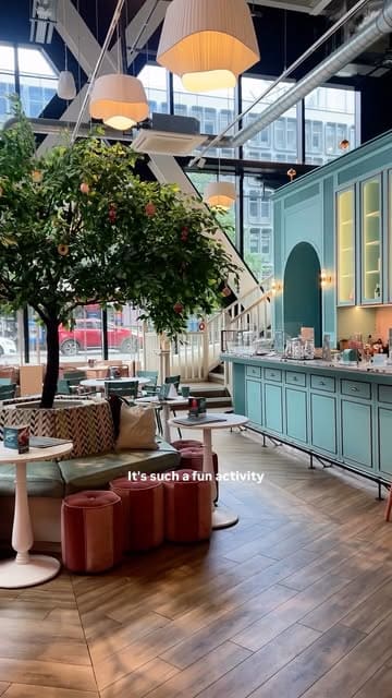 A creator visits The Big Manchester Bake for a baking competition, showcasing the venue, the process of making a lemon meringue pie, and the final result.