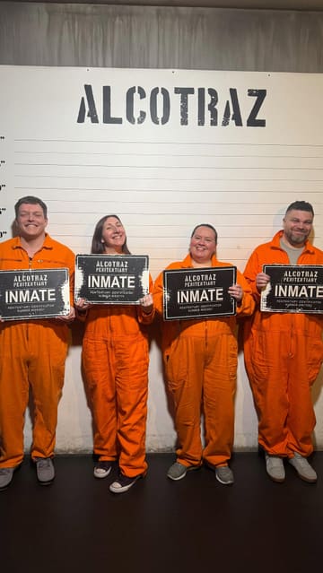 A group of friends visits Alcotraz, an immersive prison-themed bar experience. The video follows their journey from arrival to being processed, donning orange jumpsuits, and enjoying cocktails inside a prison cell.