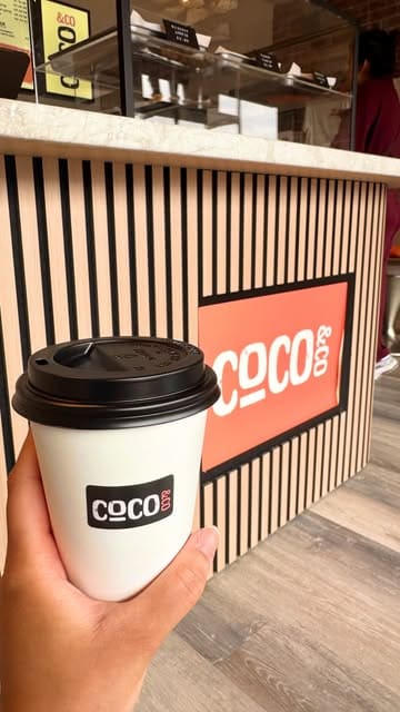 A short, handheld tour of a new independent coffee shop in Fenham, Newcastle, showcasing the interior, menu, merchandise, and a selection of pastries and coffee.