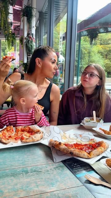 A family-focused vlog featuring a visit to Edinburgh Street Food, highlighting the variety of food options and the relaxed, family-friendly atmosphere of the venue.