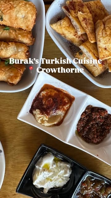 A family-focused vlog-style video showcasing a visit to Burak's Turkish Cuisine, featuring shots of the restaurant exterior, interior, various Turkish dishes, and the children enjoying the outdoor seating area.