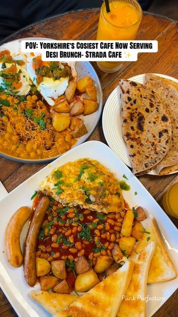 A short montage showcasing a Desi brunch menu at Strada Cafe, featuring close-up shots of plates including eggs, chana, paratha, and a full English-style breakfast.
