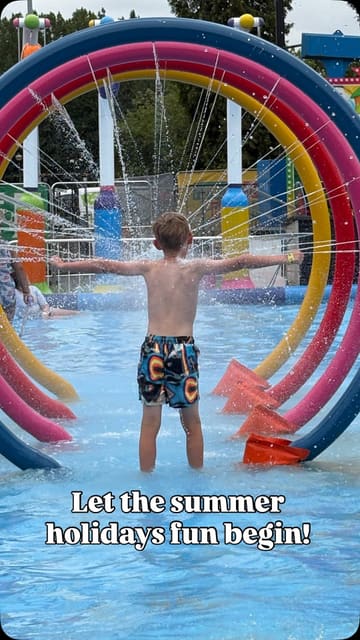 A montage of a family day out at a fairground and splash park, featuring various rides, water activities, and family entertainment.
