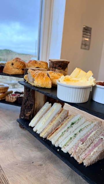 A short vlog-style video showcasing a visit to Stump Cross Caverns, featuring afternoon tea in the cafe and a tour of the caves with UV lighting effects.