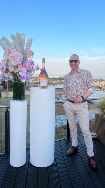 A montage video capturing a 20th-anniversary event for Whispering Angel rosé on a rooftop venue. The video features shots of the wine being poured, guests enjoying the drinks, the venue's rooftop setting, and a DJ, highlighting the celebratory atmosphere.