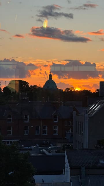 A montage showcasing Layla's Rooftop in Dublin, highlighting the sunset views, interior atmosphere, and a variety of dishes including pizza, pasta, and cocktails.