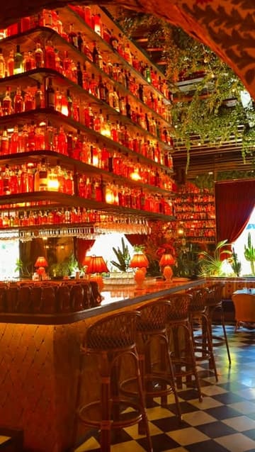 A cinematic, slow-paced montage showcasing the interior decor and menu items of a restaurant, emphasizing its romantic atmosphere and aesthetic appeal.