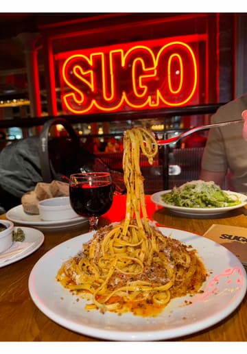 A short, aesthetic montage showcasing pasta dishes, starters, wine, and dessert at Sugo Pasta in Glasgow, set to music with minimal text overlay.