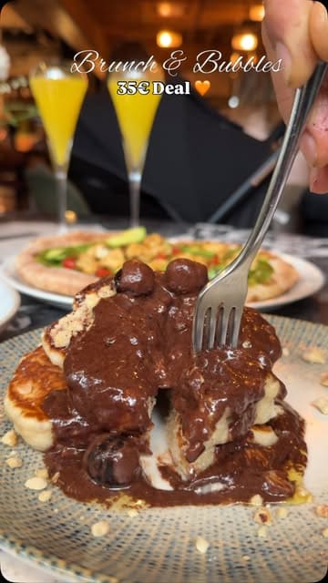 A promotional video for a brunch deal at Isabelle's in Dublin, featuring shots of the venue, the food, and a customer enjoying the experience.
