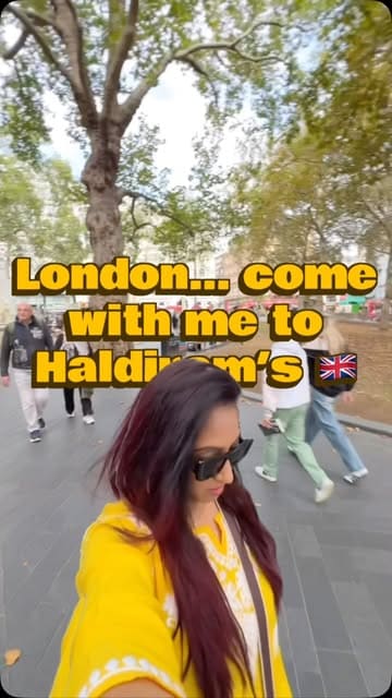 A creator visits Haldiram's in London, showcasing the interior and a wide selection of popular Indian street food dishes including Chole Bhature, Pani Puri, and Pav Bhaji.