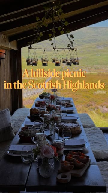 A vlog-style video showcasing a 'wild picnic' experience at Straloch Estate in the Scottish Highlands, featuring a scenic bothy, freshly prepared food, and the surrounding landscape.