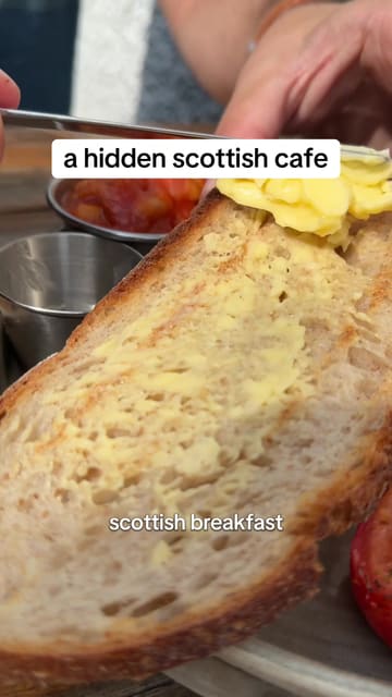 A creator visits 'The Hideaway' cafe in Bridge of Allan, Scotland, highlighting its hidden location, interior atmosphere, and homemade breakfast offerings.
