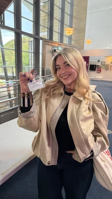 A day-in-the-life vlog following a business owner as she visits a bakery for cookies, works at her office, and attends a university placement launch event.