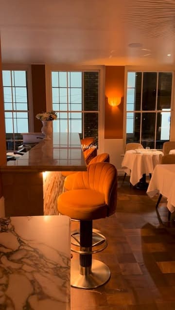 A short, cinematic montage showcasing the interior, table settings, and various dishes at Latine Mayfair. The video focuses on the elegant atmosphere and high-quality food presentation, using smooth camera movements and transitions to create a sophisticated vibe.