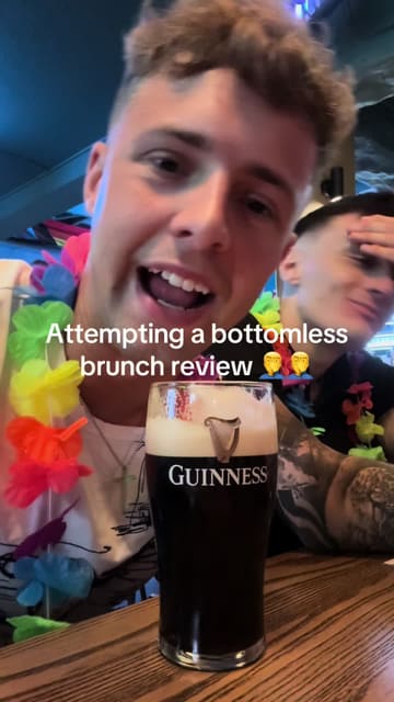 A creator reviews a bottomless brunch experience at The Adelphi in Preston. The video features the creator and friends enjoying drinks and food, highlighting the attentive service and the overall fun atmosphere of the venue.