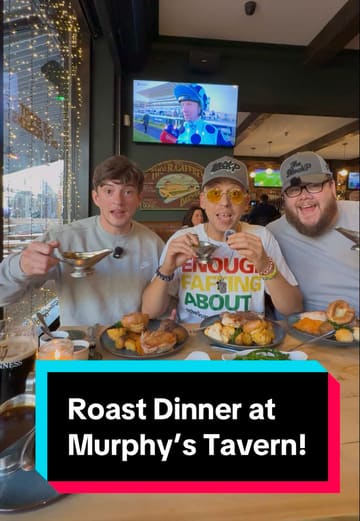 A trio of creators visit Murphy's Tavern in Crosby to review their Sunday roast. The video features close-ups of the roast dinner, including lamb, beef, and chicken, as well as cauliflower cheese and dessert. They also showcase the venue's atmosphere, live music, and branded Guinness pints, providing an enthusiastic and positive review.