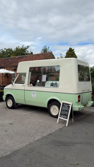 A promotional video for 'Berry Social,' a mobile ice cream van, featuring the preparation and serving of soft-serve ice cream to customers.