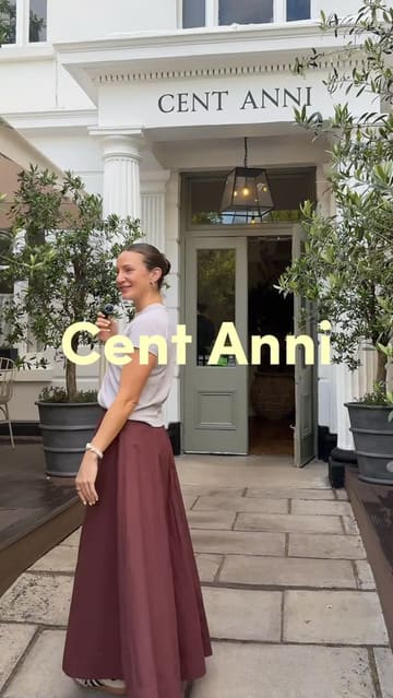 The video is a review of a new Italian restaurant called Cent Anni in St John's Wood. The creator introduces the venue, highlights the atmosphere, and showcases the food and drinks, including a steak dish and desserts.