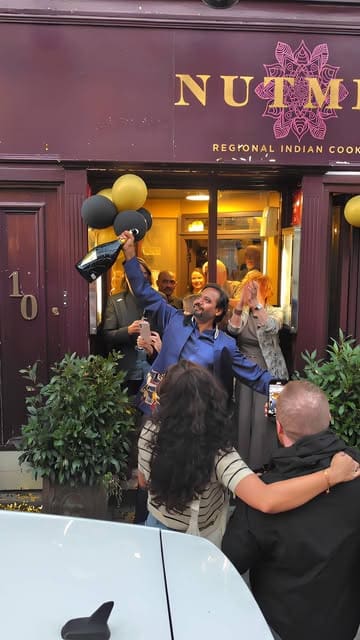 A montage video capturing the 10th-anniversary celebration at Nutmeg, an Indian restaurant in Bristol. The video features shots of guests celebrating, champagne popping, dancing, and close-ups of various Indian dishes and a birthday cake.