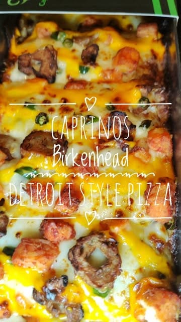 A promotional video for Caprinos Pizza in Birkenhead, showcasing the preparation and final product of their new Detroit-style pizza range.