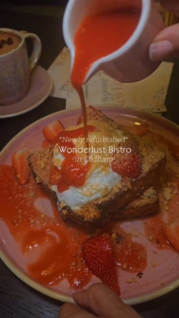A montage of various dishes and drinks at the newly refurbished Wonderlust Bistro in Oldham, featuring close-ups of cheese pulls, steak and eggs, and French toast.