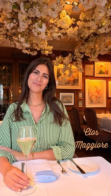 A review of the Midsummer Night's Dream set menu at Clos Maggiore in London, featuring shots of the restaurant's romantic interior, the food courses, and the creator's reactions.