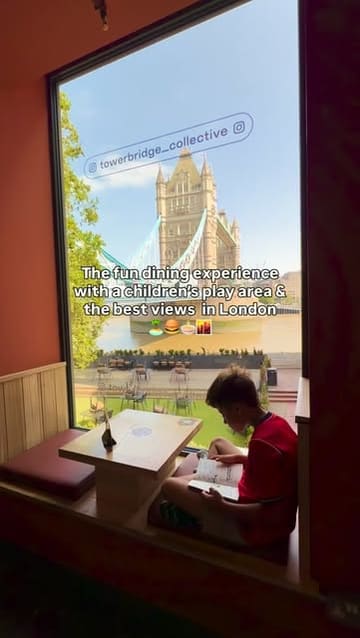 A short, montage-style video showcasing Tower Bridge Collective, a family-friendly food hall in London. The video highlights the venue's key features, including a large indoor sandpit, children's books, arcade games, and views of Tower Bridge, while panning across various food stall signs.